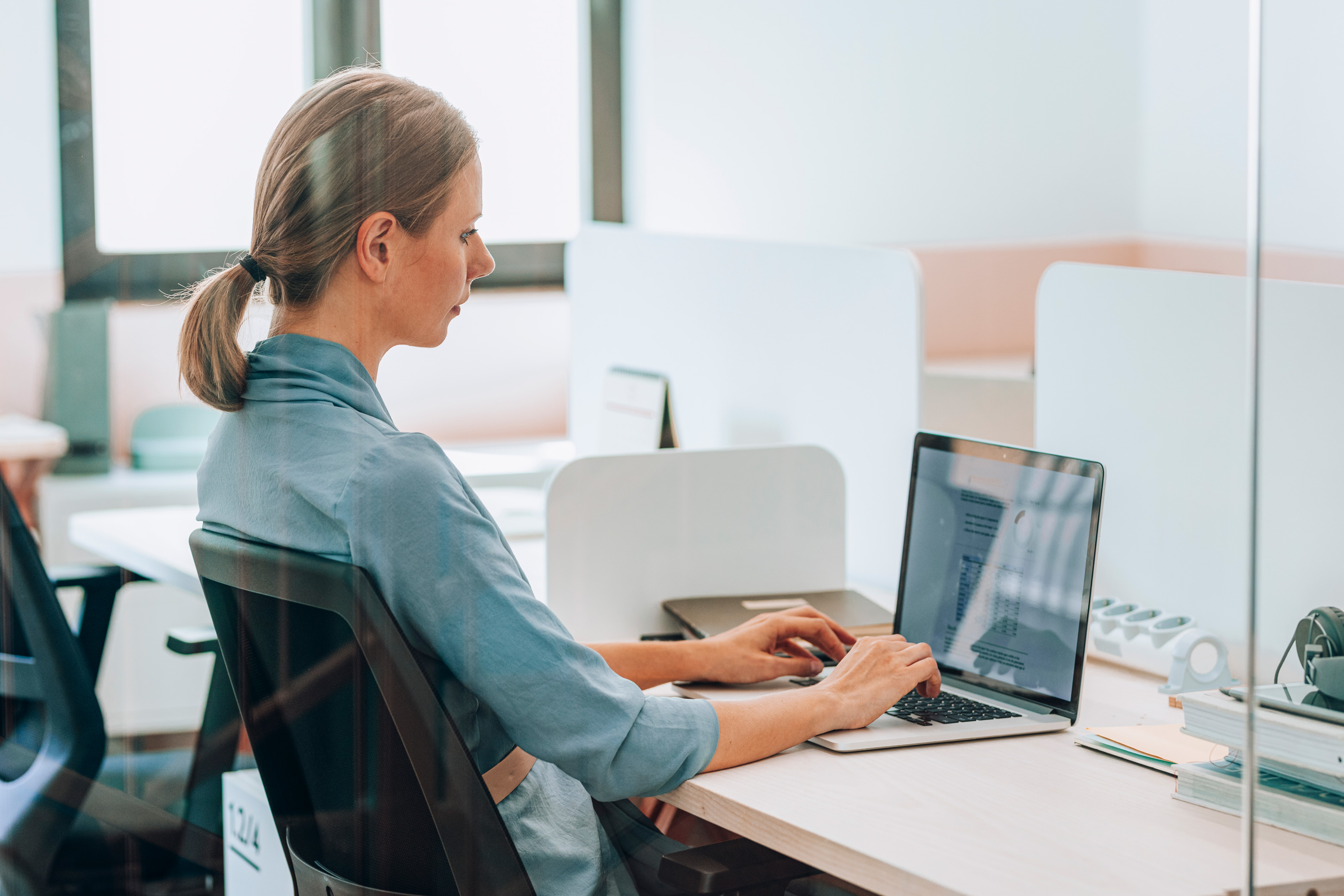 Businesswoman Working At Her Office